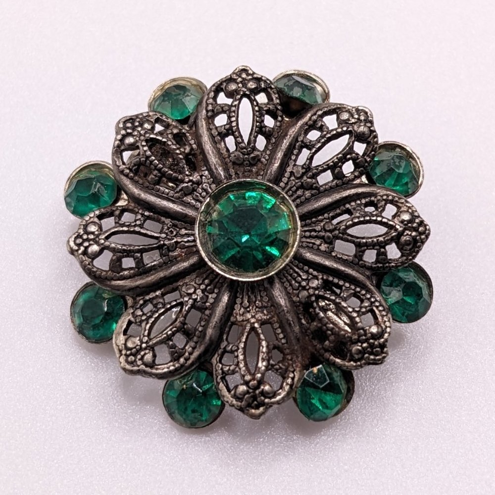 antique marcasite flower brooch w/ green stones